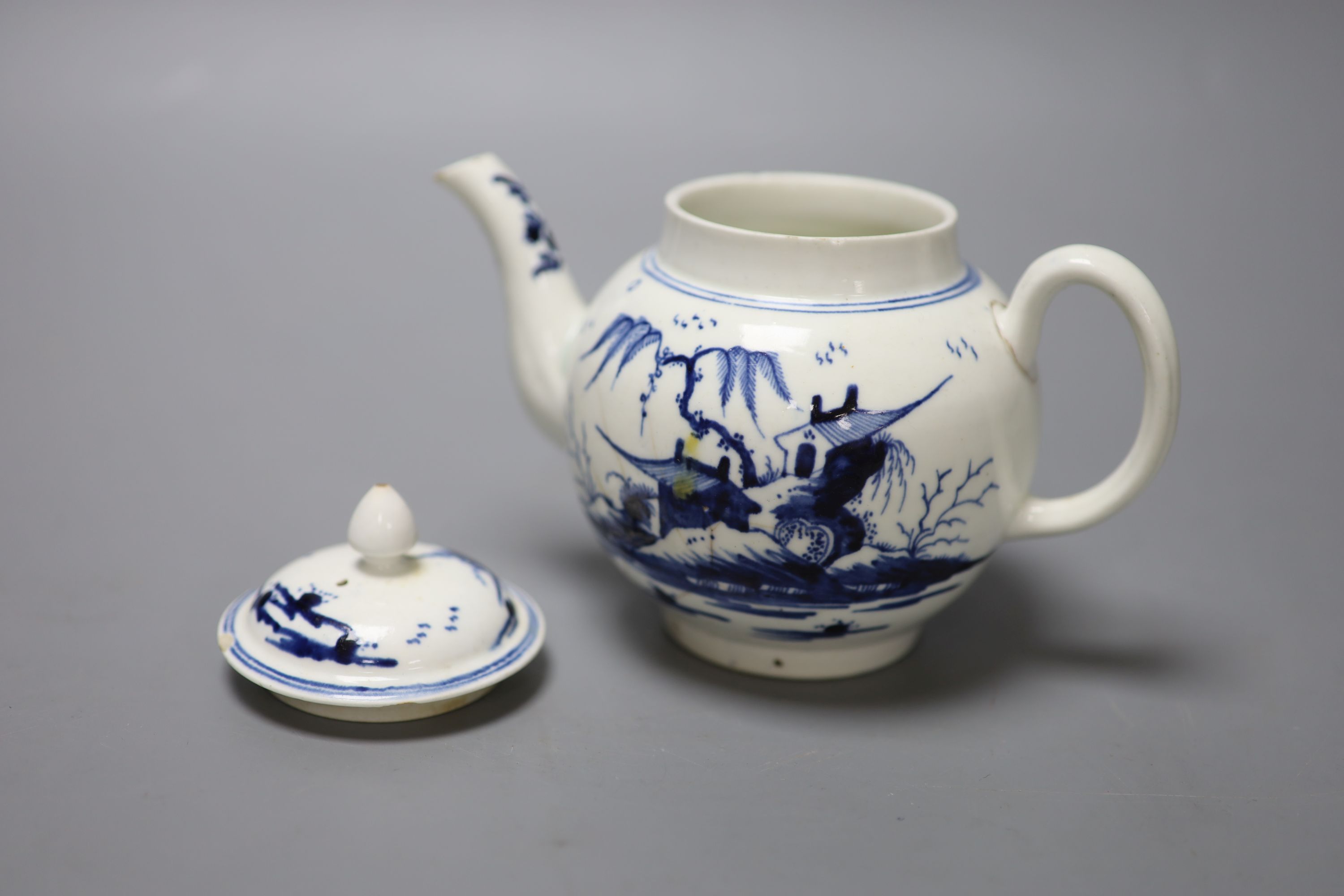 An 18th century Derby rare teapot and cover painted with Chinese landscapes